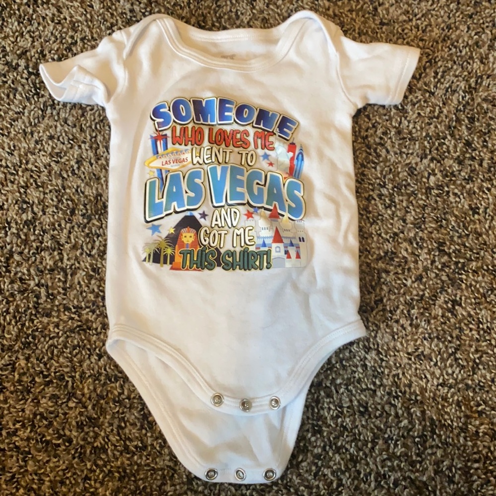 White 6-12 months Vegas onesie with snaps on bottom